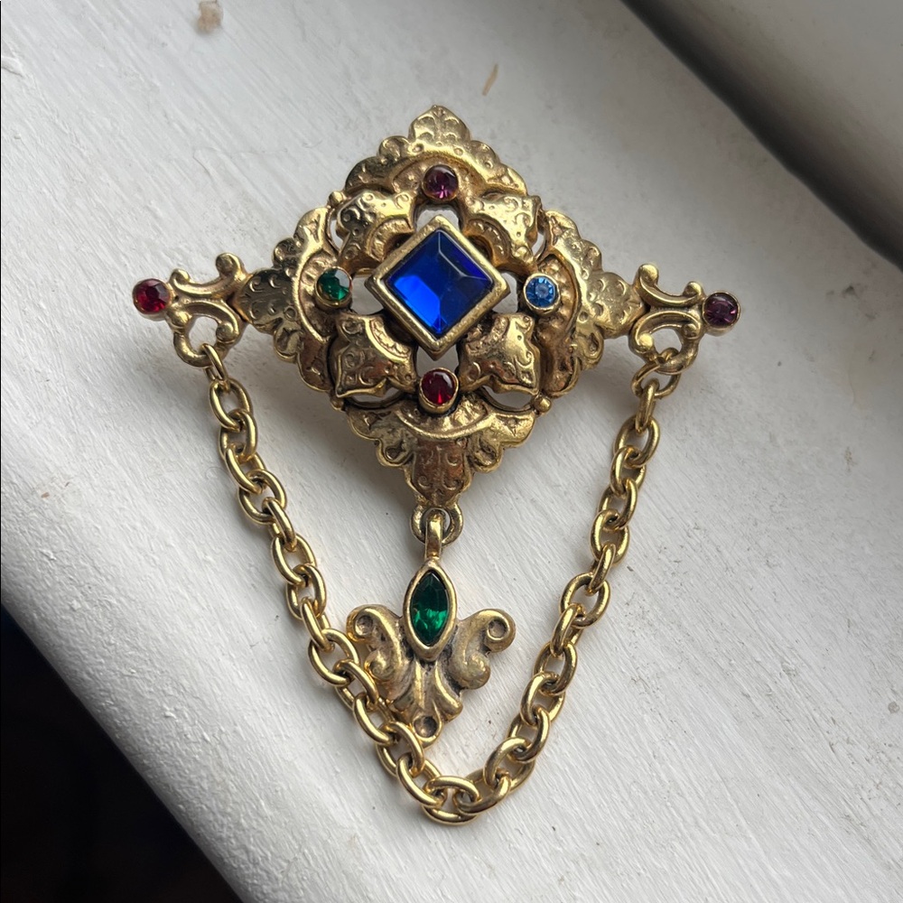 AJC American Jewelry Company Vintage Gold Brooch with Blue and Red Accents